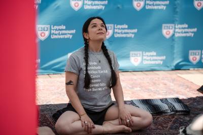 Yoga instructor with crossed legs